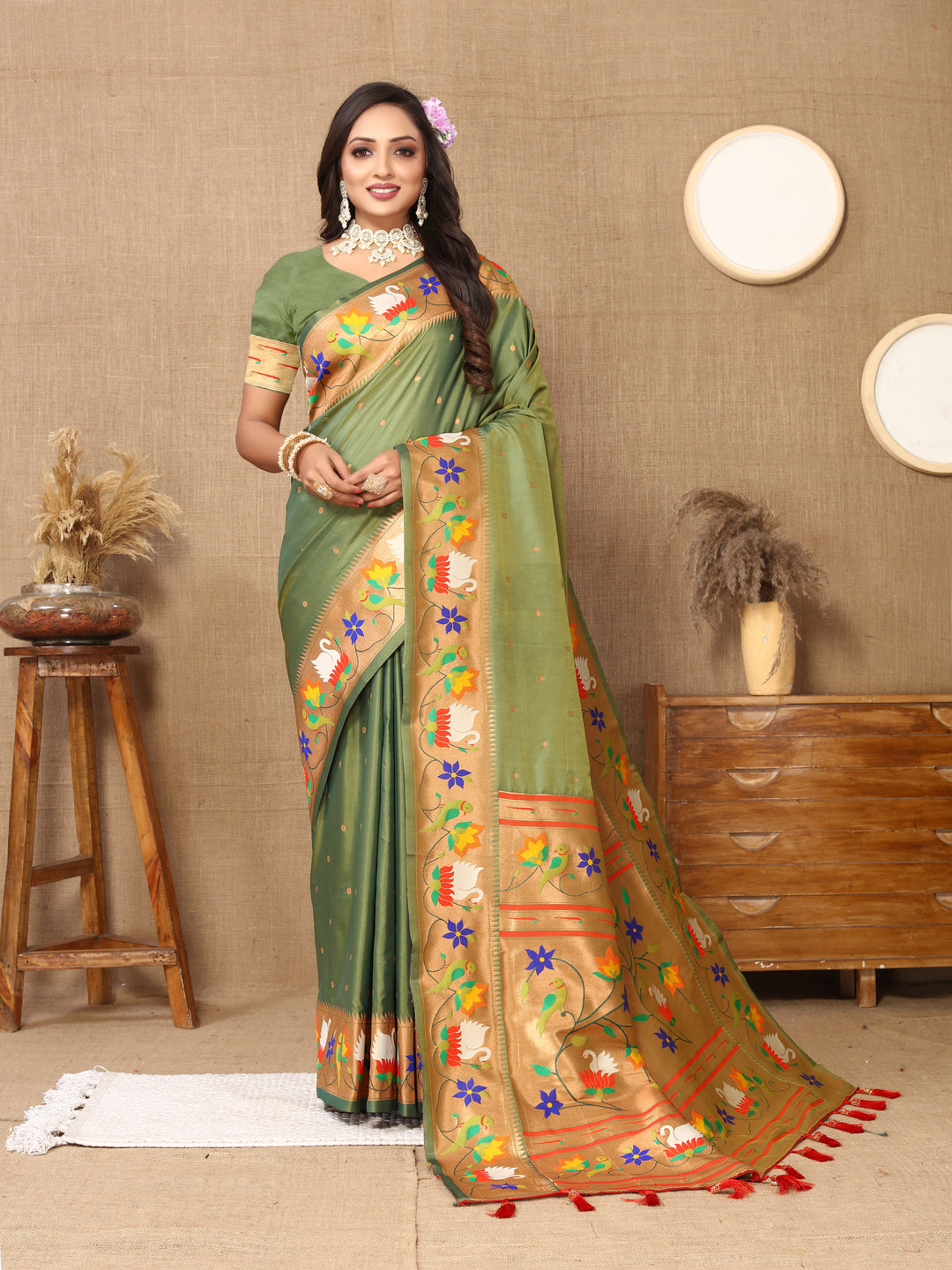 Exquisite olive Paithani silk saree with intricate meenakari work and zari border, perfect for special occasions.