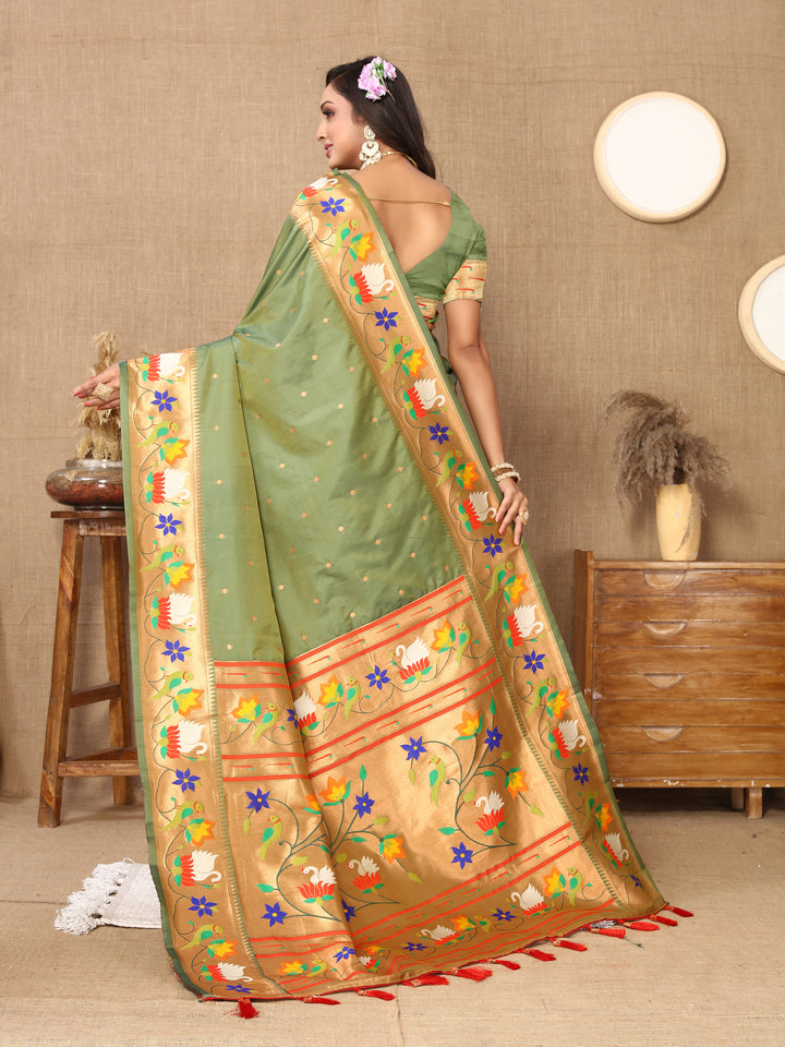 Stunning olive Paithani silk saree featuring intricate meenakari weaving and zari border, perfect for cultural events.