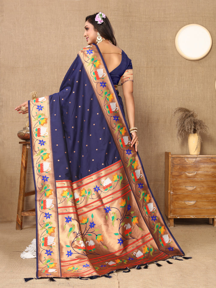 Elegant navy Paithani silk saree with delicate meenakari work and a luxurious zari border, ideal for weddings.