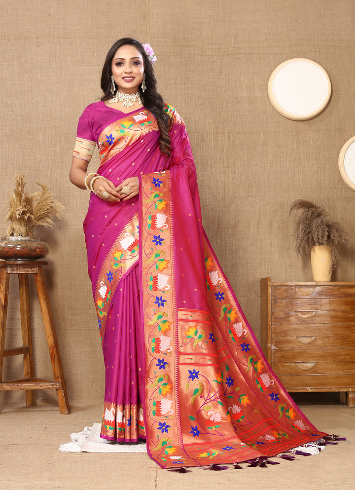 Elegant bright-pink Paithani silk saree with rich meenakari weaving and golden zari border, perfect for formal occasions.