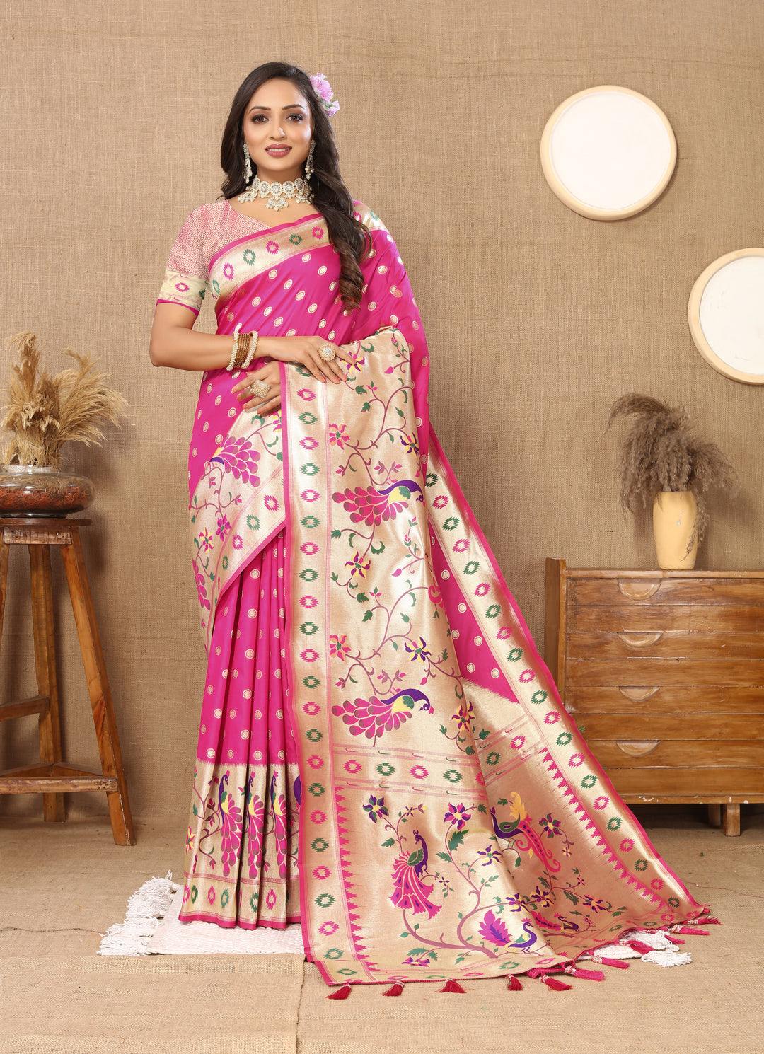 Pink Paithani silk saree with beautiful zari weaving, ideal for festive celebrations.