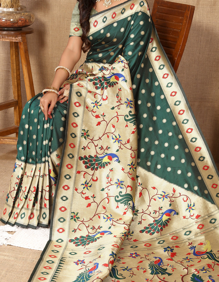 Timeless teal-green Paithani saree with ornate zari weaving, ideal for special gatherings.