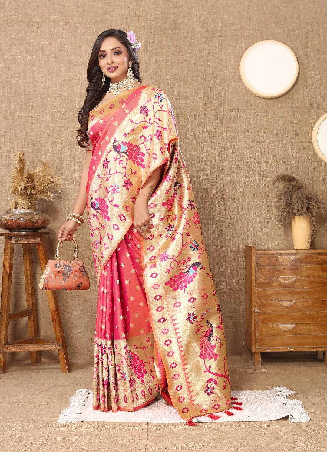 Classic peach silk saree with beautiful zari work, perfect for Indian cultural events.