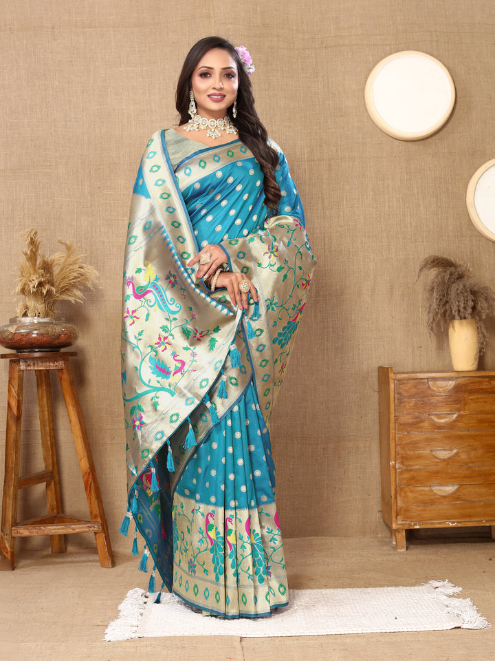 Classic turquoise Paithani saree with luxurious zari pallu, perfect for traditional occasions.