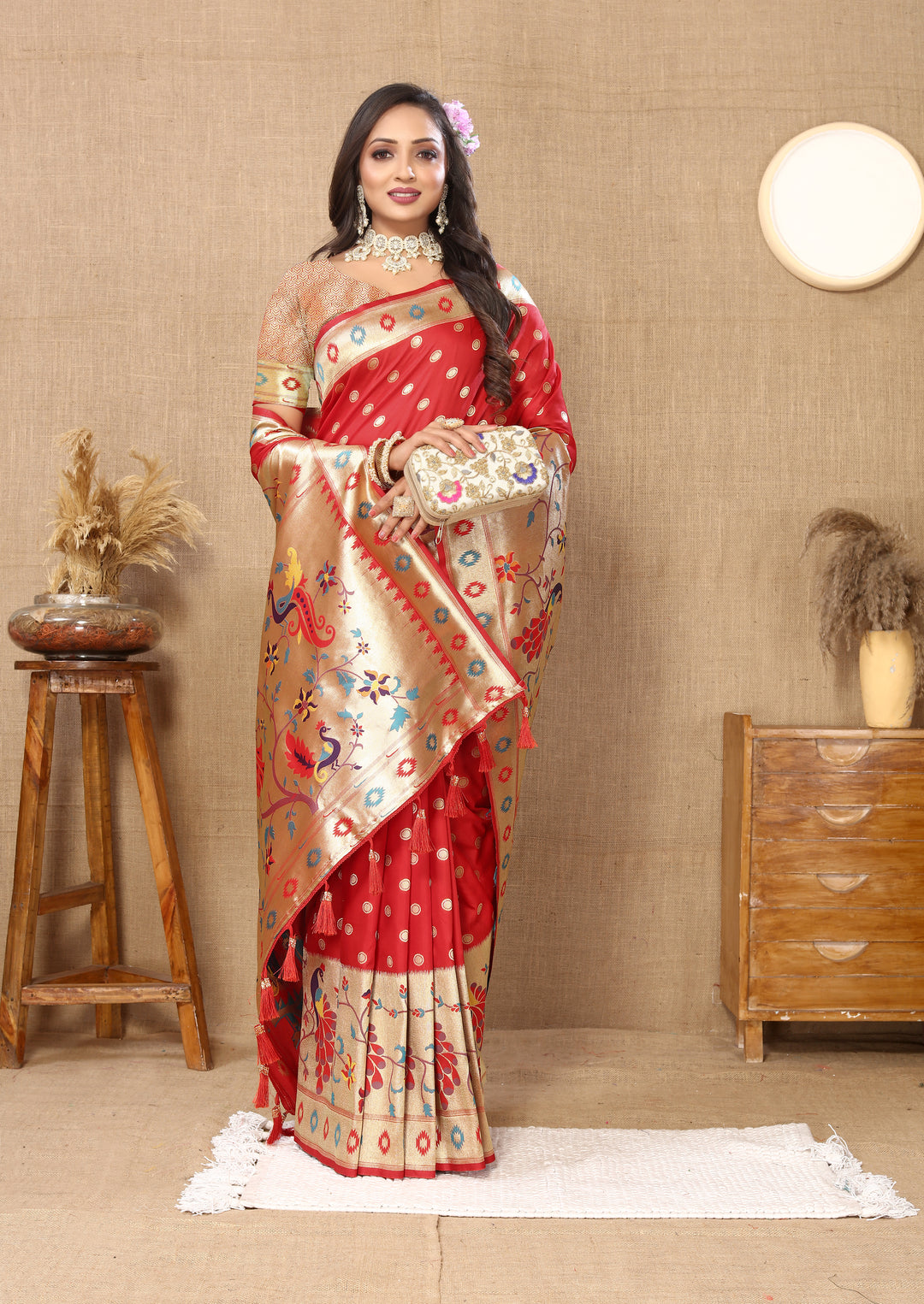 Classic red Paithani saree with ornate zari details and silk blouse, perfect for festive events.