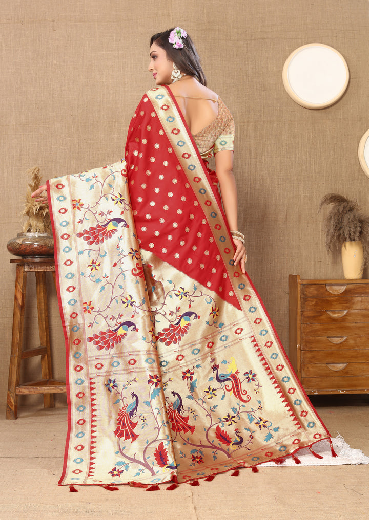 Timeless red silk saree with rich zari and matching blouse piece, ideal for cultural occasions.