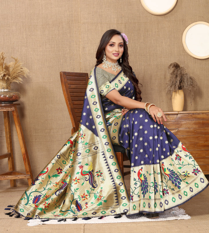 Classic navy silk saree with luxurious zari and matching silk blouse, perfect for festivals.