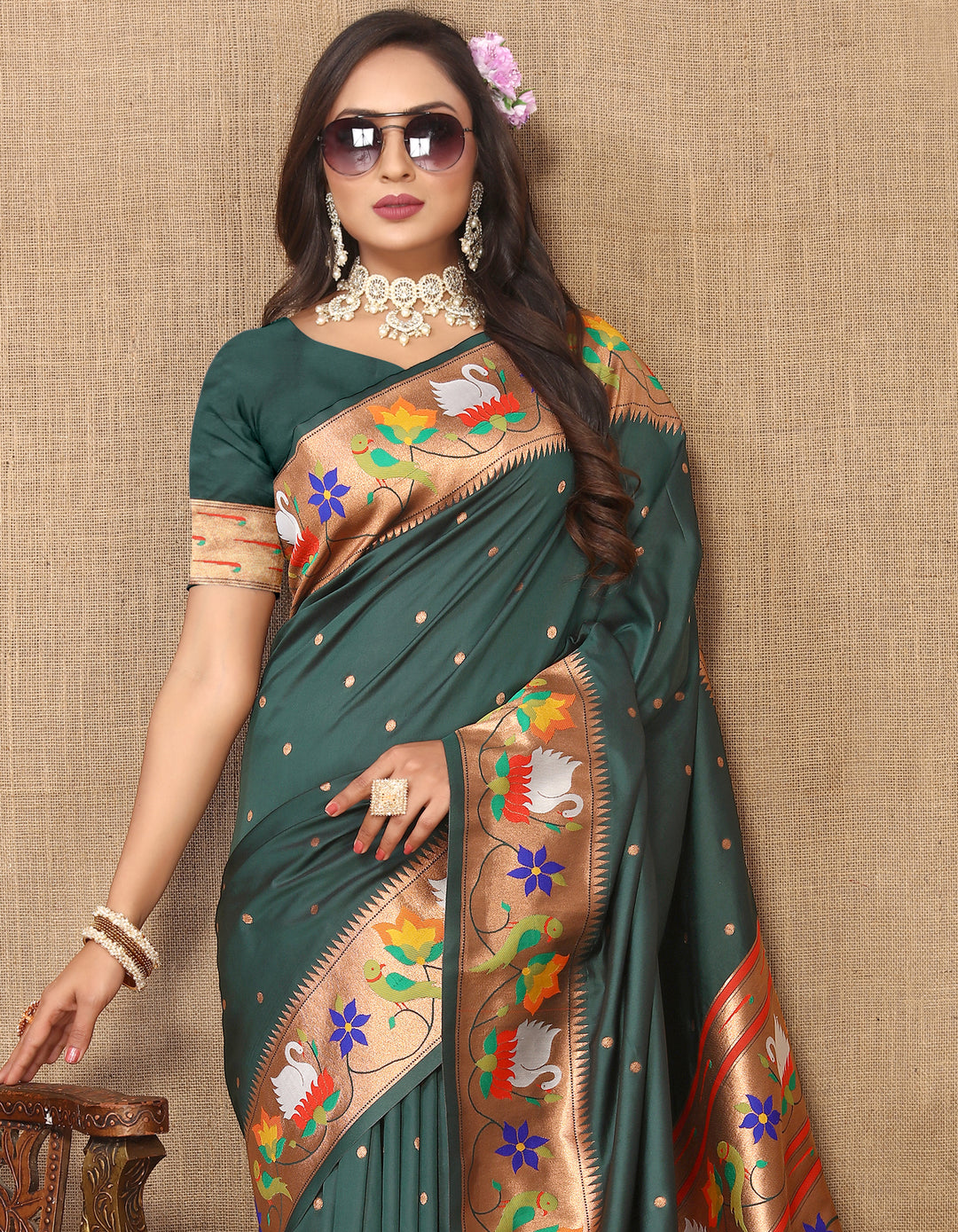 Stunning parrot-green Paithani silk saree with intricate meenakari weaving and a golden zari border, perfect for cultural events.