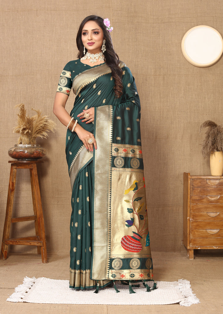 Gorgeous teal green Paithani silk saree with intricate zari and meenakari work, perfect for cultural events.