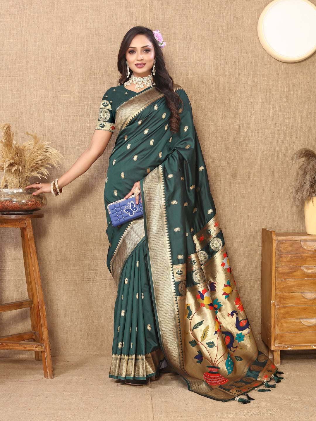 Elegant teal green designer Paithani saree with luxurious zari and meenakari designs, ideal for weddings.