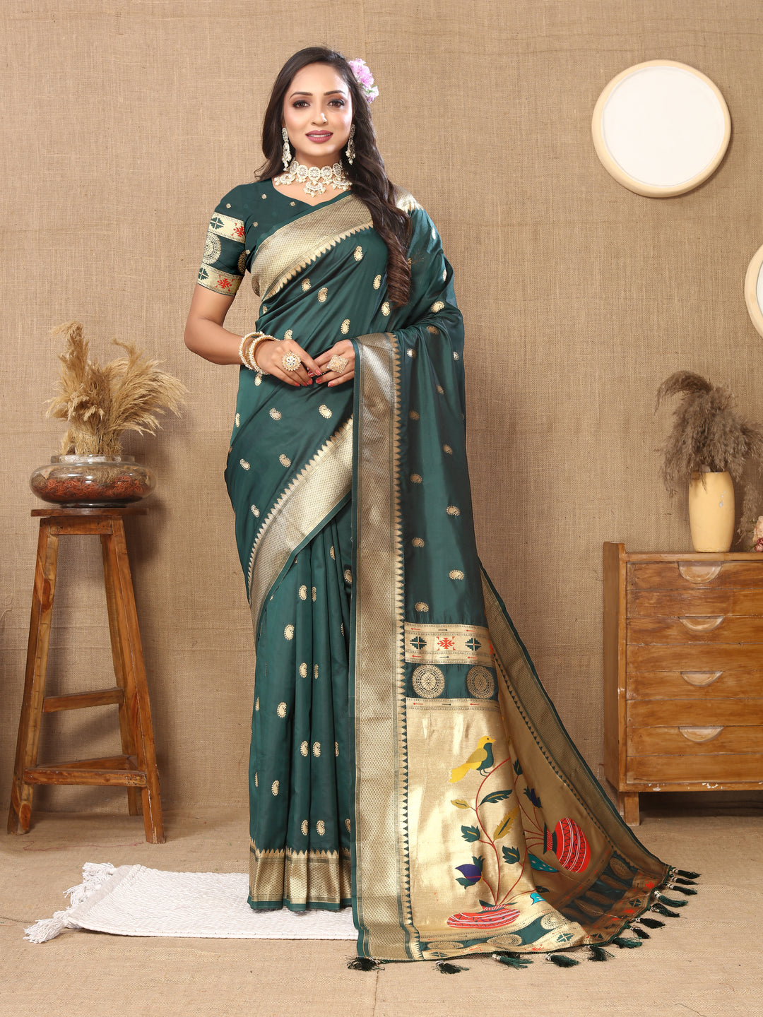 Timeless teal green Paithani saree with beautiful zari and meenakari patterns, perfect for grand occasions.