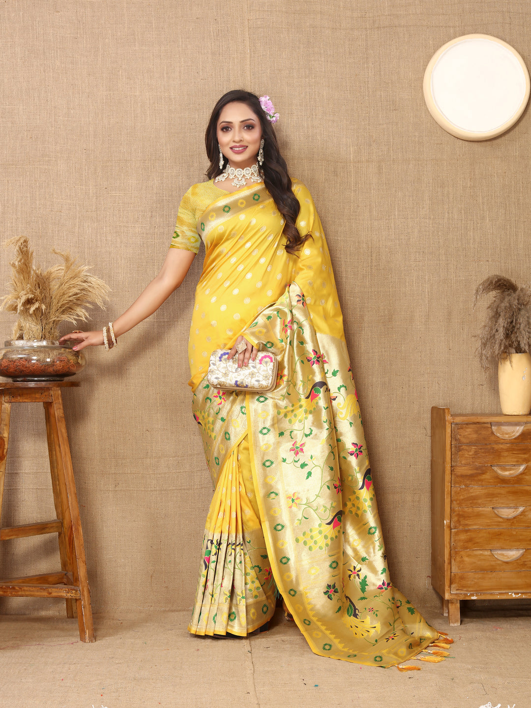 Yellow Paithani silk saree with luxurious zari weaving, ideal for Indian events.