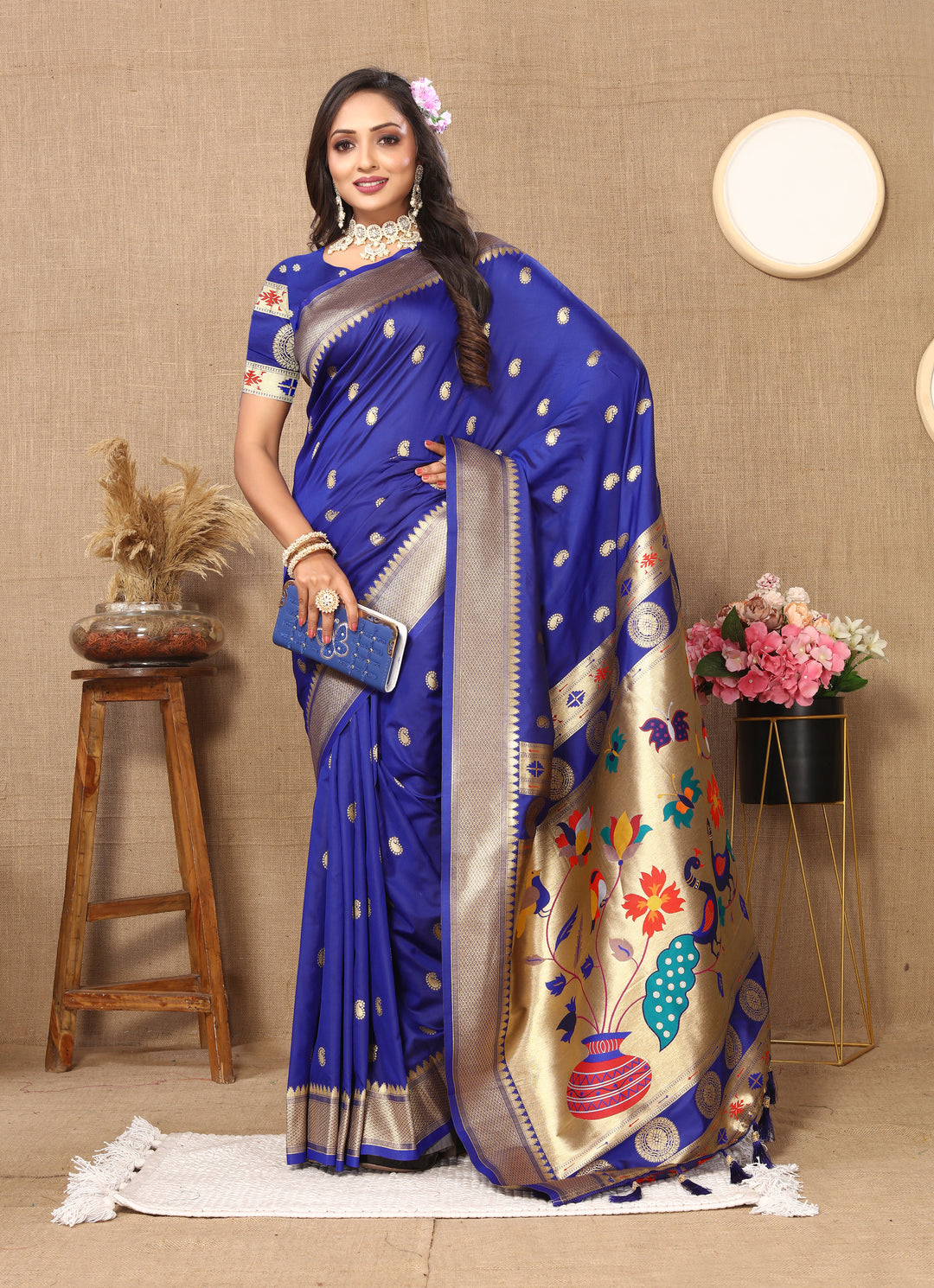 Elegant teal blue Paithani silk saree with exquisite meenakari and zari detailing, ideal for formal events.