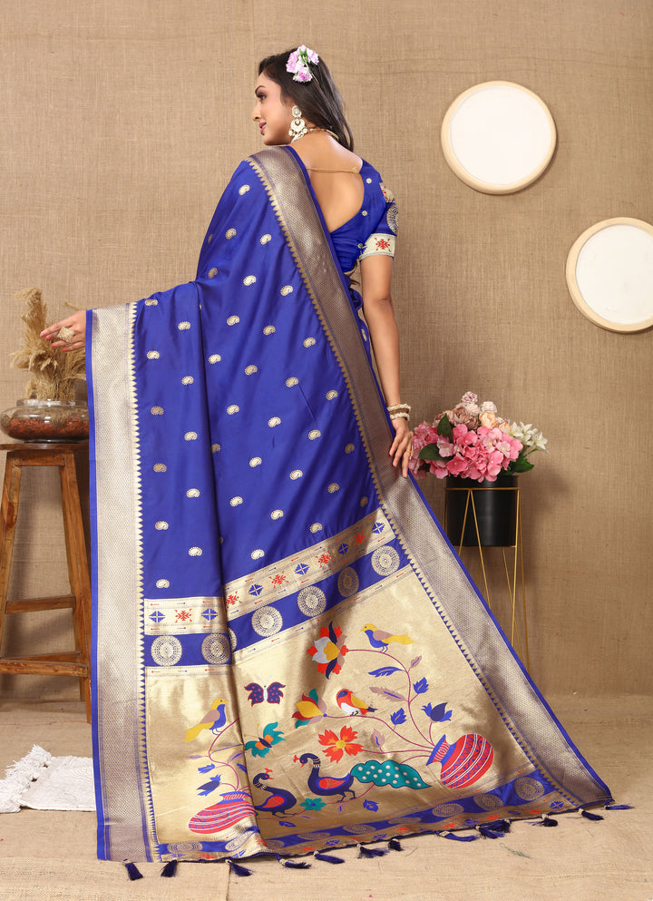 Traditional royal blue Paithani saree with intricate zari work, ideal for grand Indian events.