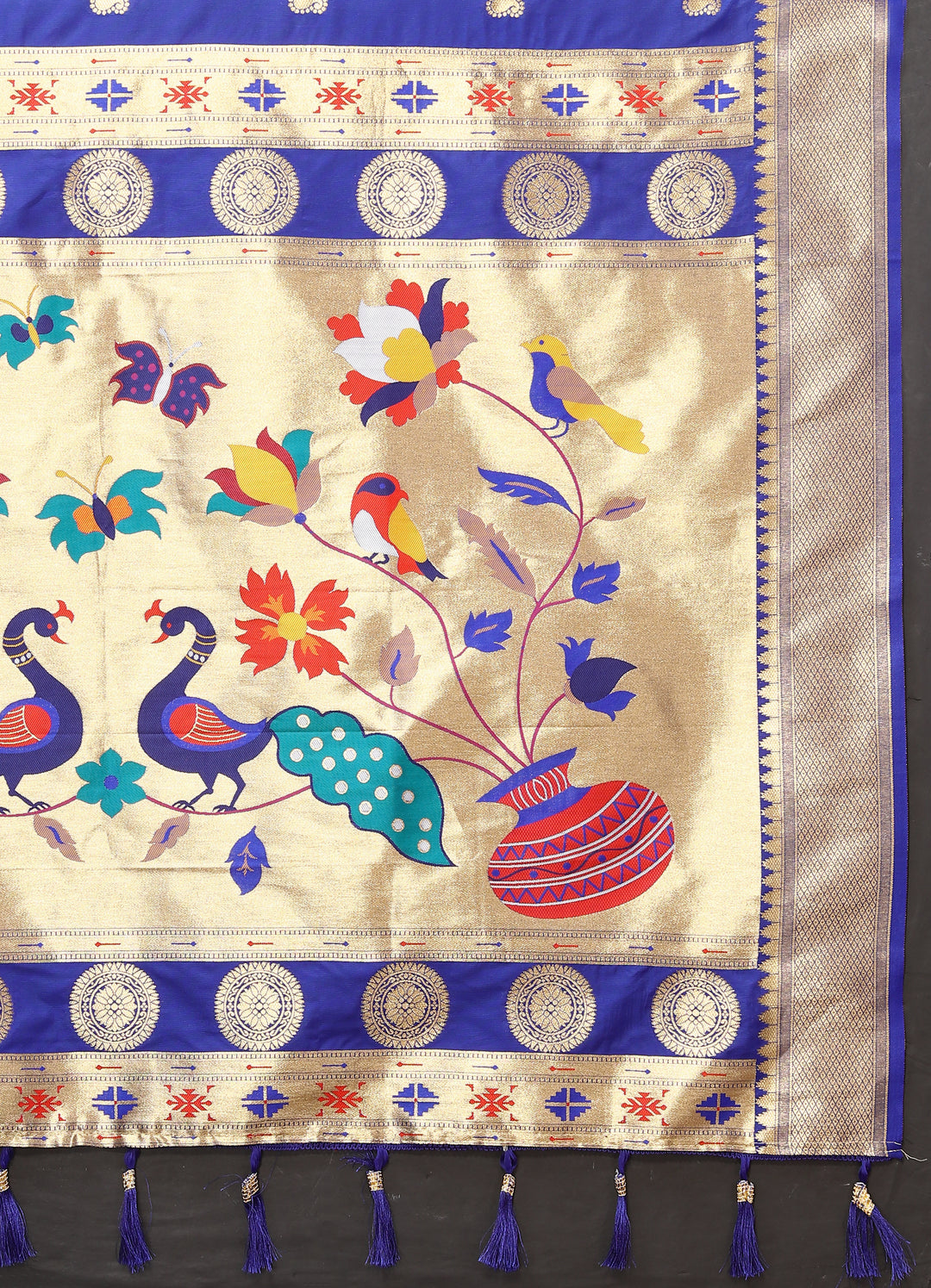 Sophisticated royal blue Paithani silk saree with elaborate meenakari and zari patterns, perfect for festive occasions.