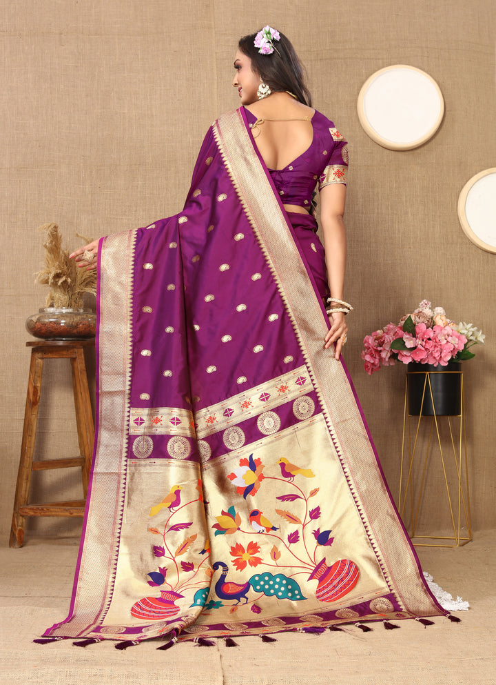 Traditional purple Paithani saree with elaborate zari and meenakari patterns, ideal for festive celebrations.