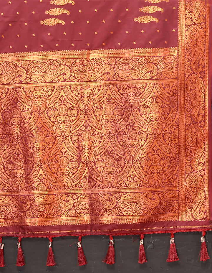 Beautiful pink paisley woven saree with rich zari detailing and bold contrast border, great for cultural functions.