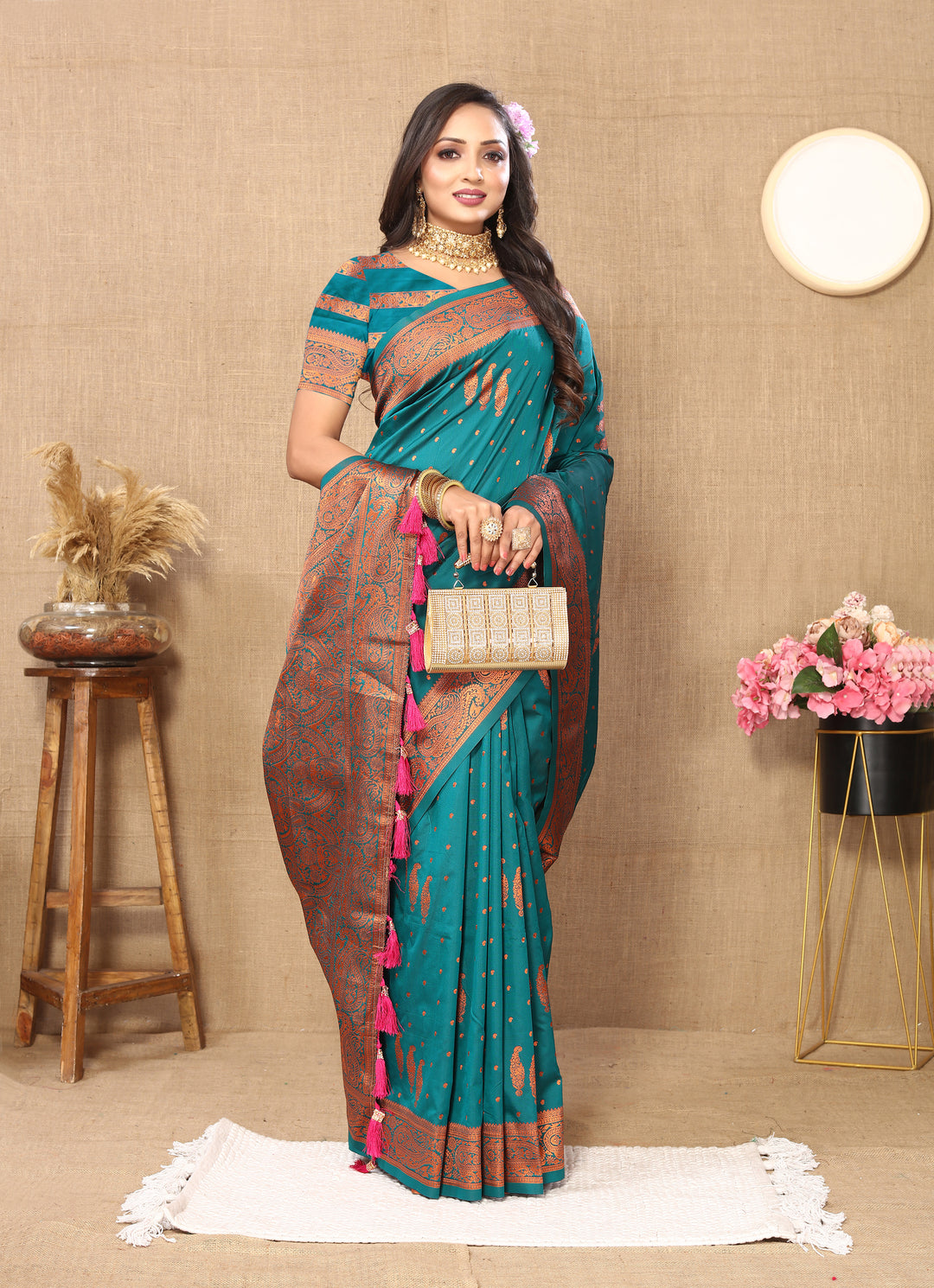 Stunning navy paisley woven saree with intricate zari pallu and contrast border, designed for festive occasions.