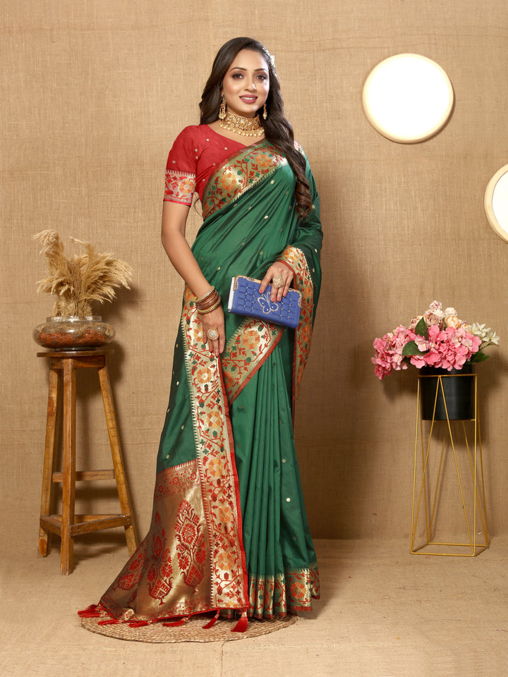 Beautiful teal green Paithani silk saree with traditional Meenakari and zari pallu work.