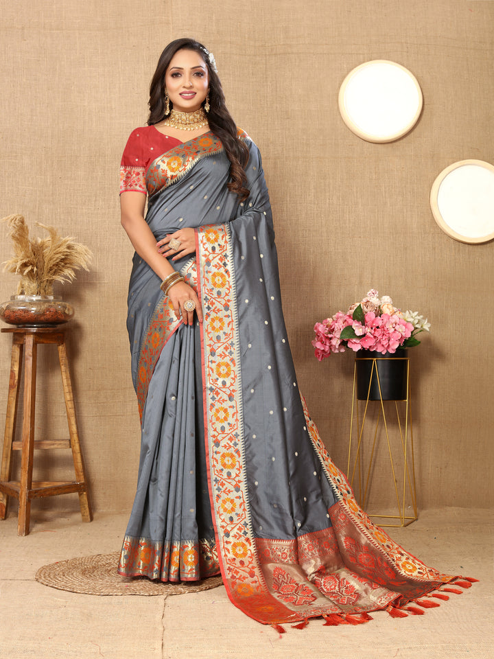 Gray Paithani silk saree featuring exquisite Meenakari weaving and a sparkling zari pallu.