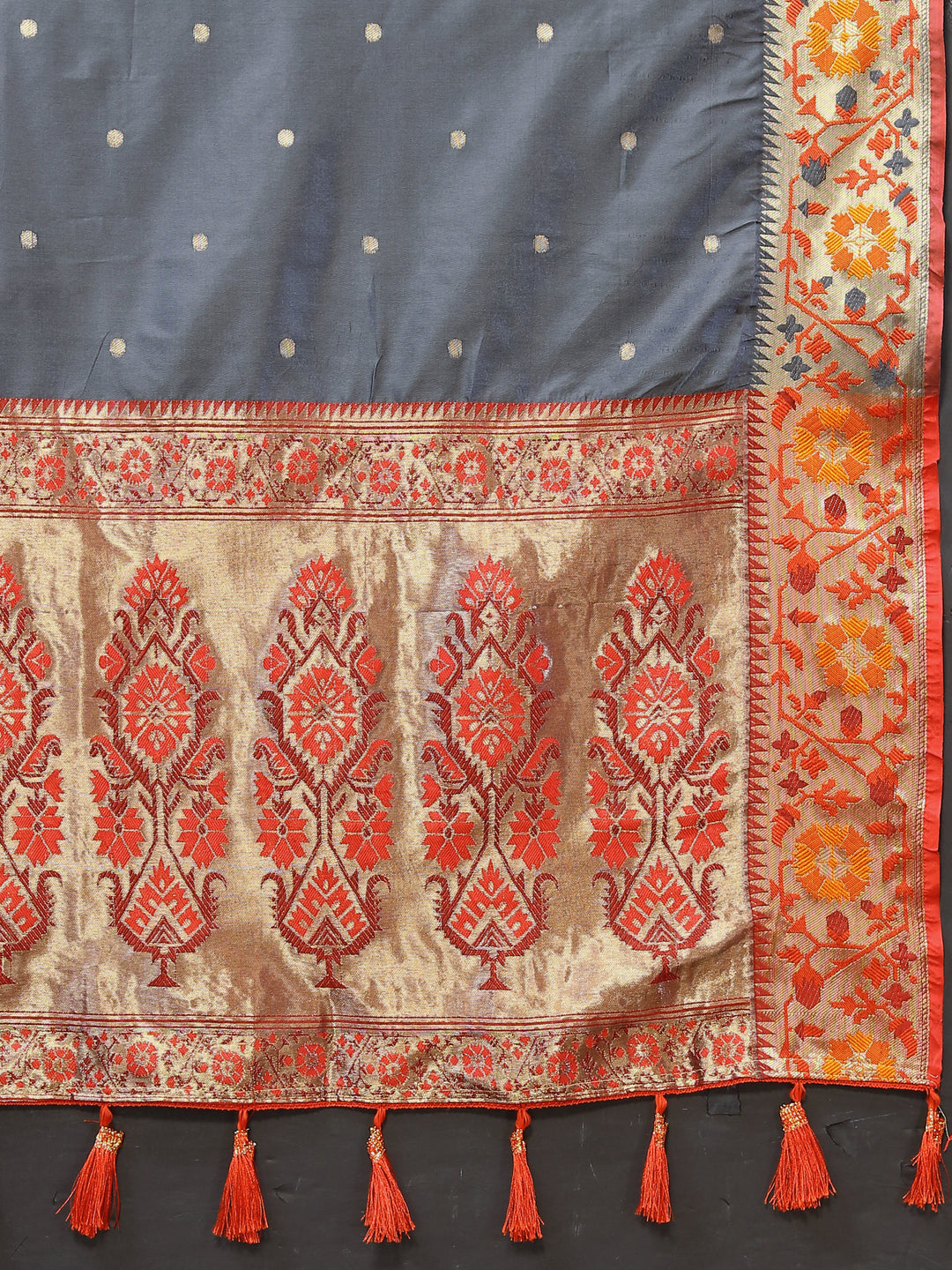 Gray silk Paithani saree with intricate Meenakari weaving and a shimmering zari-adorned pallu.