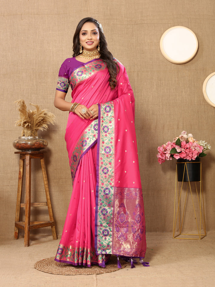 Exquisite pink Paithani silk saree featuring intricate Meenakari weaving and a zari pallu.