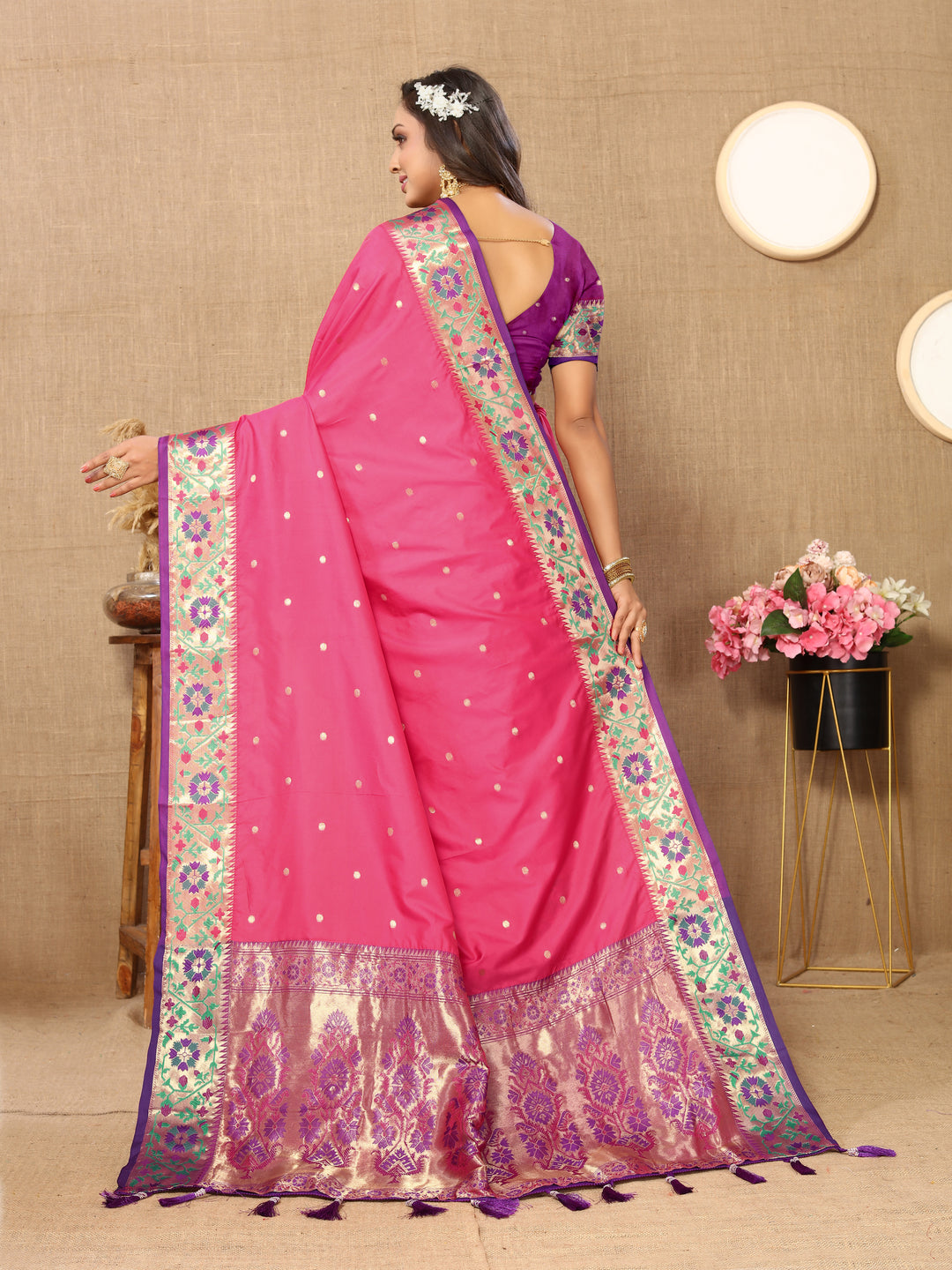 Traditional pink Paithani silk saree with Meenakari weaving and a shining zari pallu.