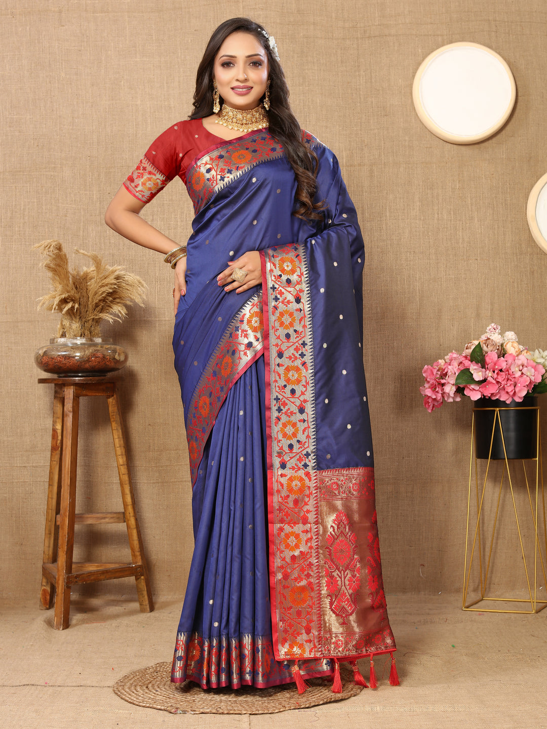 Timeless navy blue Paithani silk saree featuring Meenakari weaving and a dazzling zari pallu.