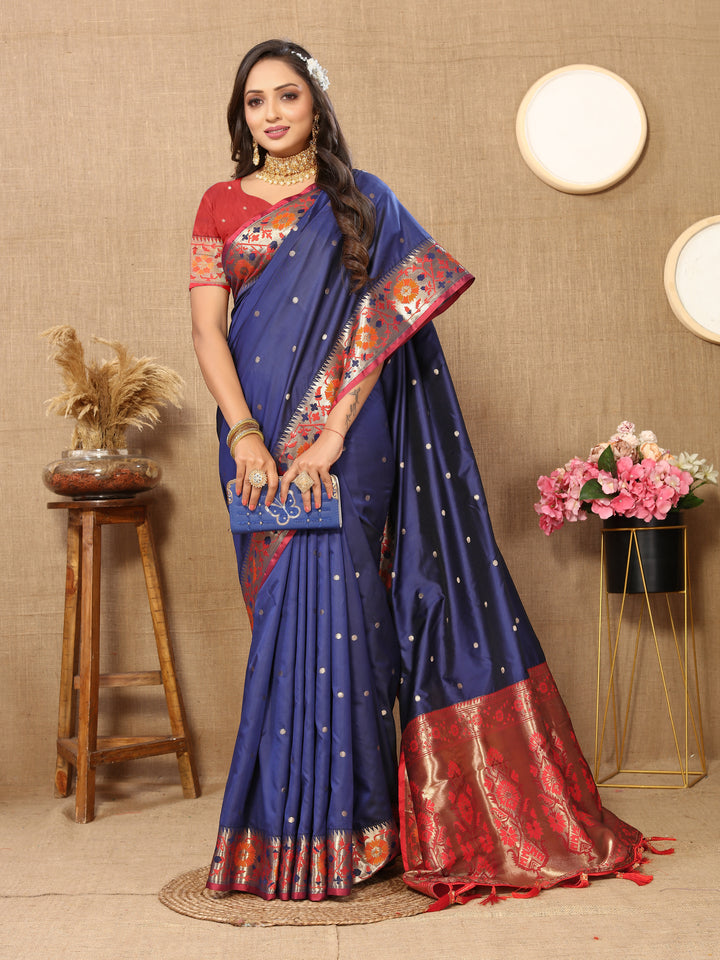 Navy Paithani silk saree with exquisite Meenakari weaving and a radiant zari pallu.