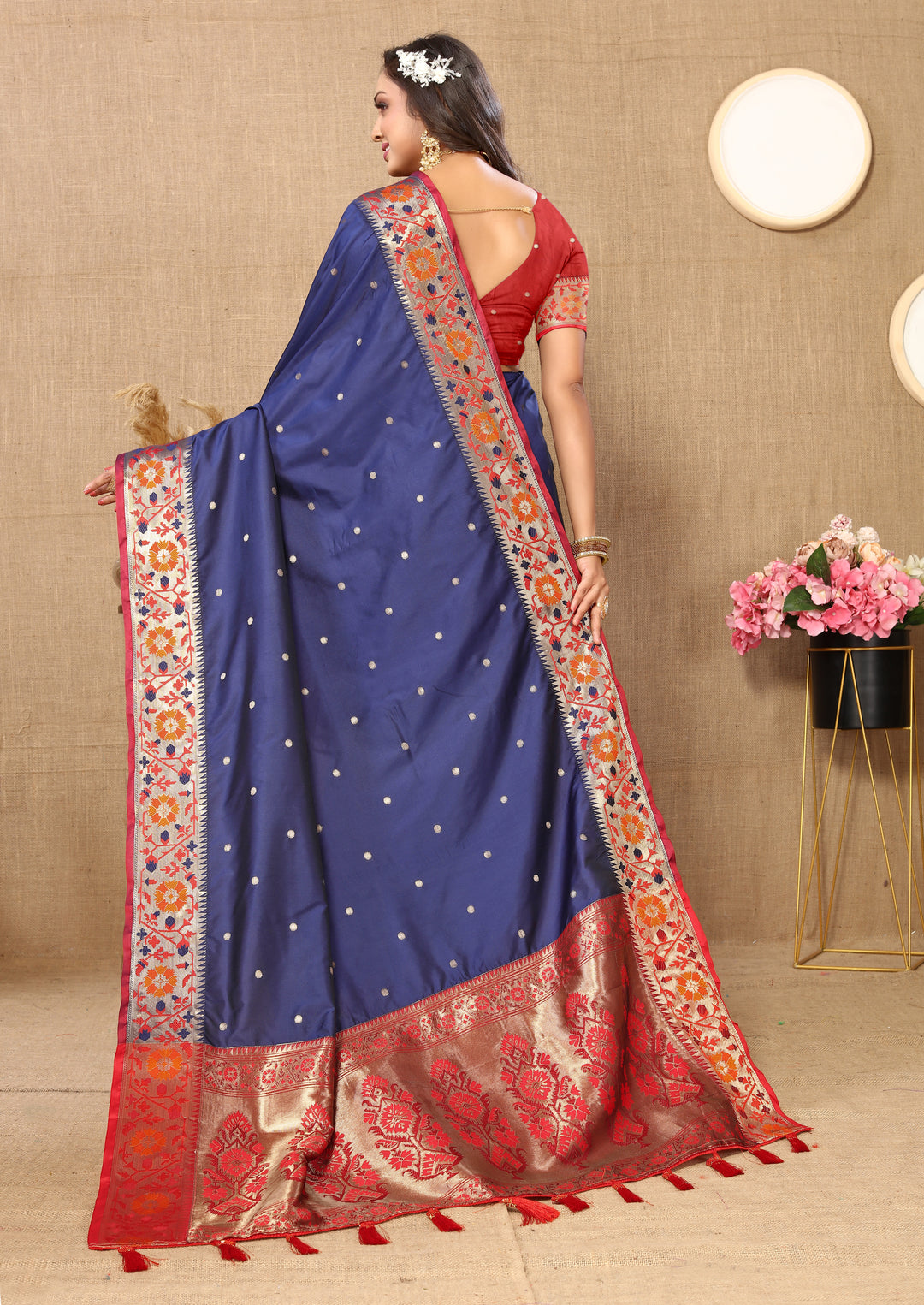 Rich navy Paithani saree with Meenakari weaving and a stunning zari-adorned pallu.