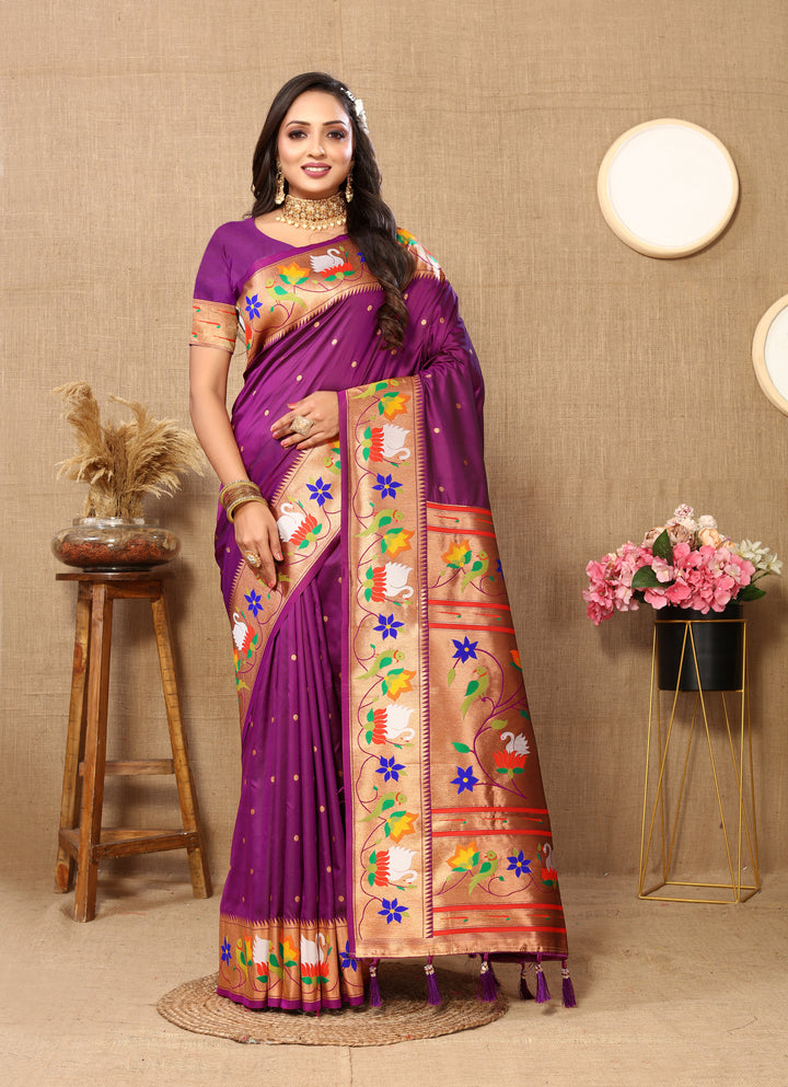 Gorgeous purple Paithani silk saree with delicate meenakari weaving and a shimmering zari border, perfect for bridal wear.