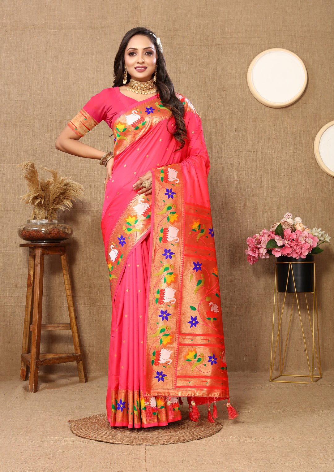 Navy blue Paithani silk saree, intricate meenakari weaving, zari border.