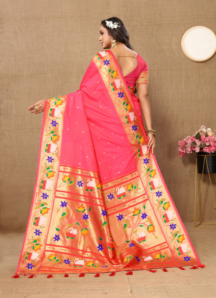 Orange, soft Paithani silk saree, meenakari weaving, zari border.