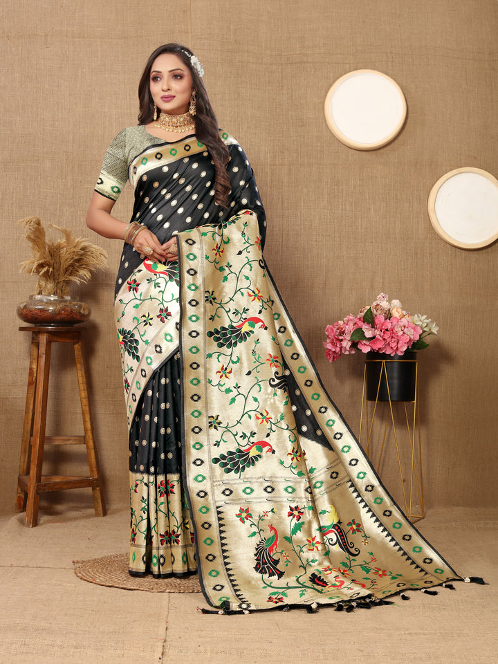 Elegant black silk saree with intricate zari details and silk blouse, perfect for weddings.