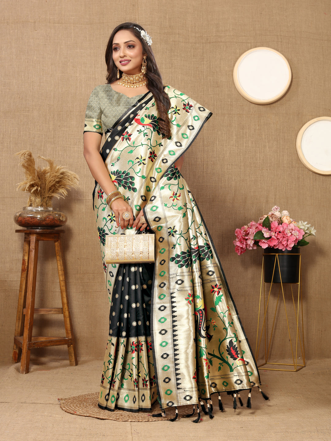 Classic black Paithani saree with luxurious zari and matching blouse piece, ideal for special occasions.