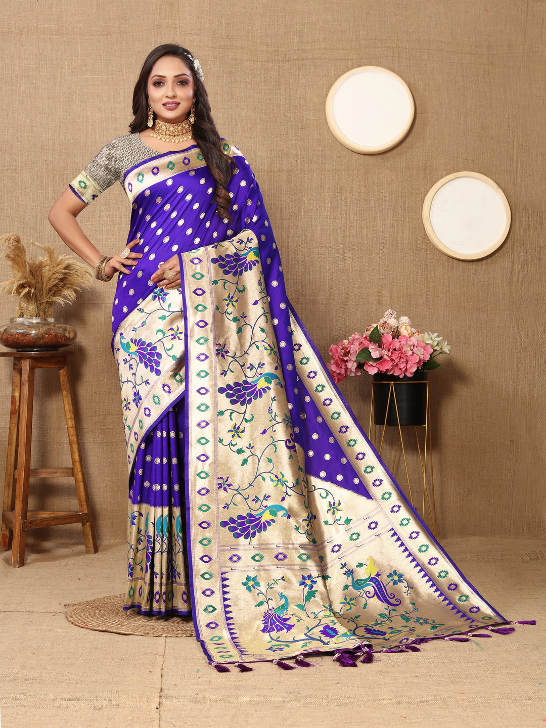 Elegant blue silk saree with detailed zari and silk blouse piece, perfect for cultural gatherings.