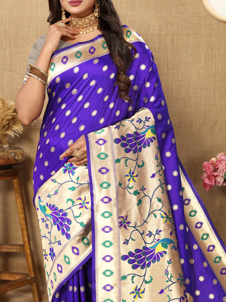 Classic blue Paithani saree with ornate zari pallu, perfect for weddings and formal events.