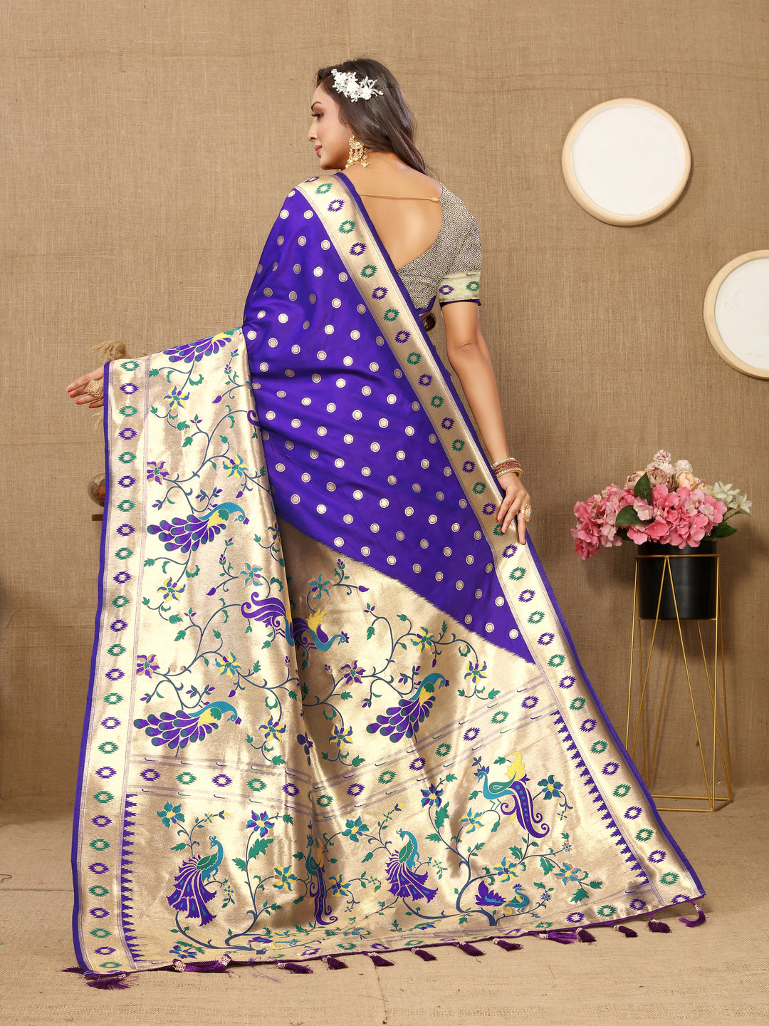 Timeless blue silk saree featuring luxurious zari weaving, ideal for grand celebrations.