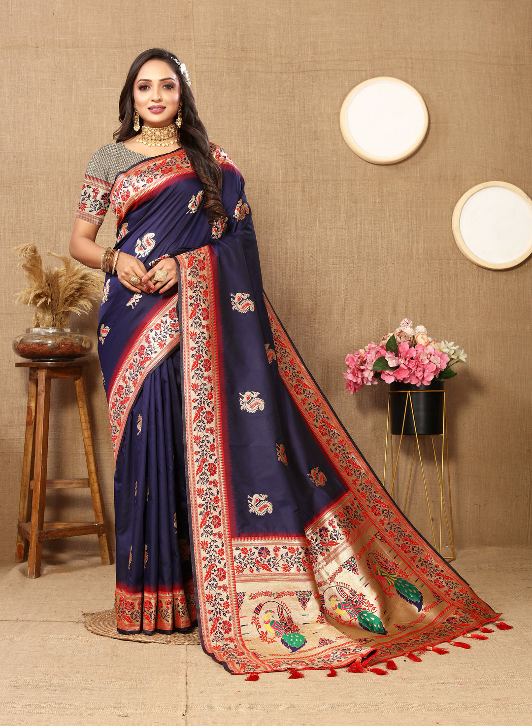 Elegant navy silk saree featuring zari border and tassels, perfect for weddings.