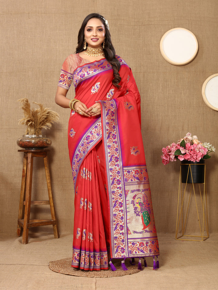 Red Paithani silk saree with stunning zari border and stylish tassels, perfect for festive celebrations.