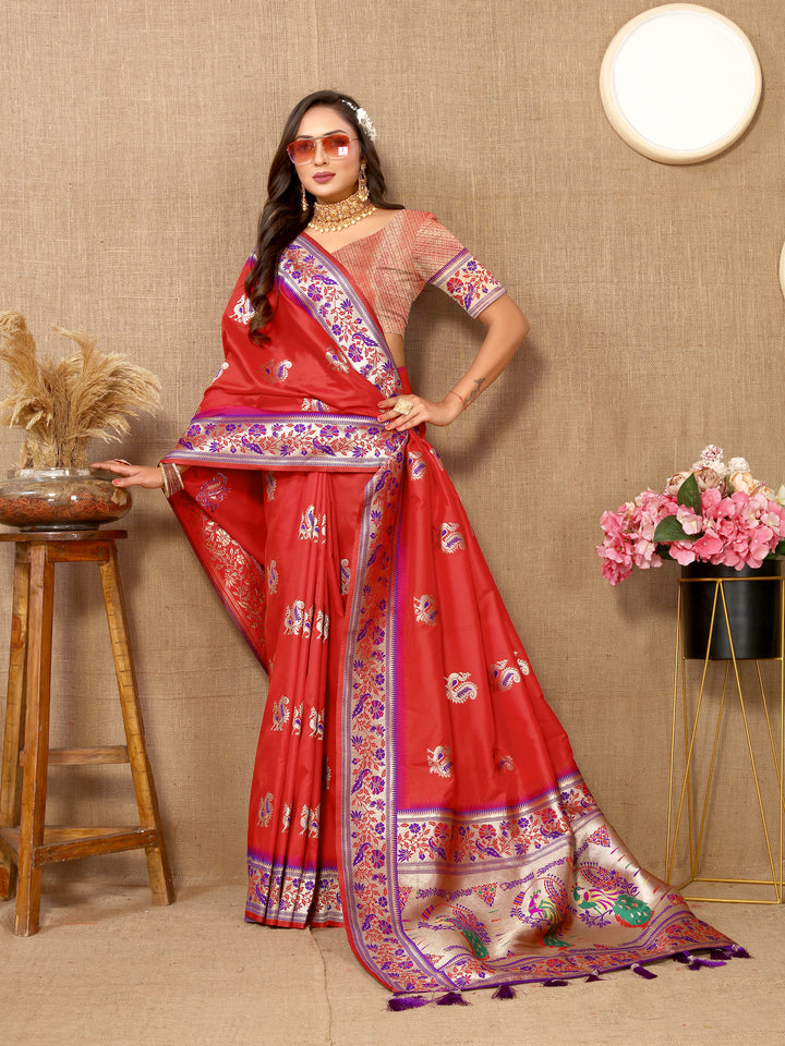 Red Paithani silk saree with beautiful zari border and tassels, perfect for cultural events.