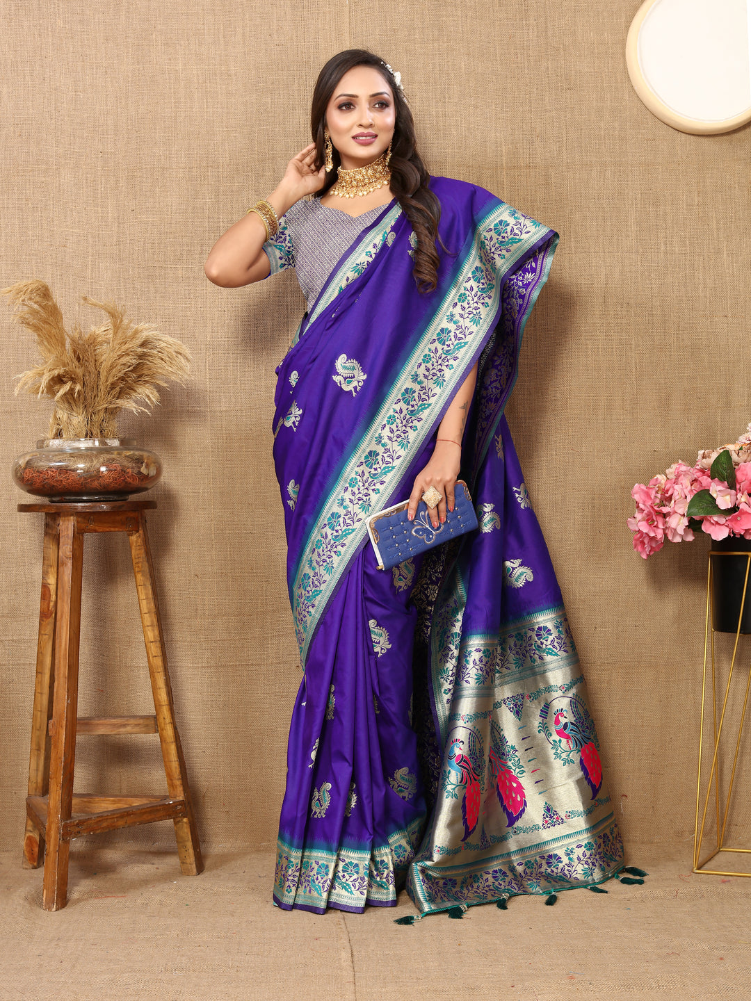 Timeless blue silk saree with rich zari border and stylish tassels, perfect for cultural events.