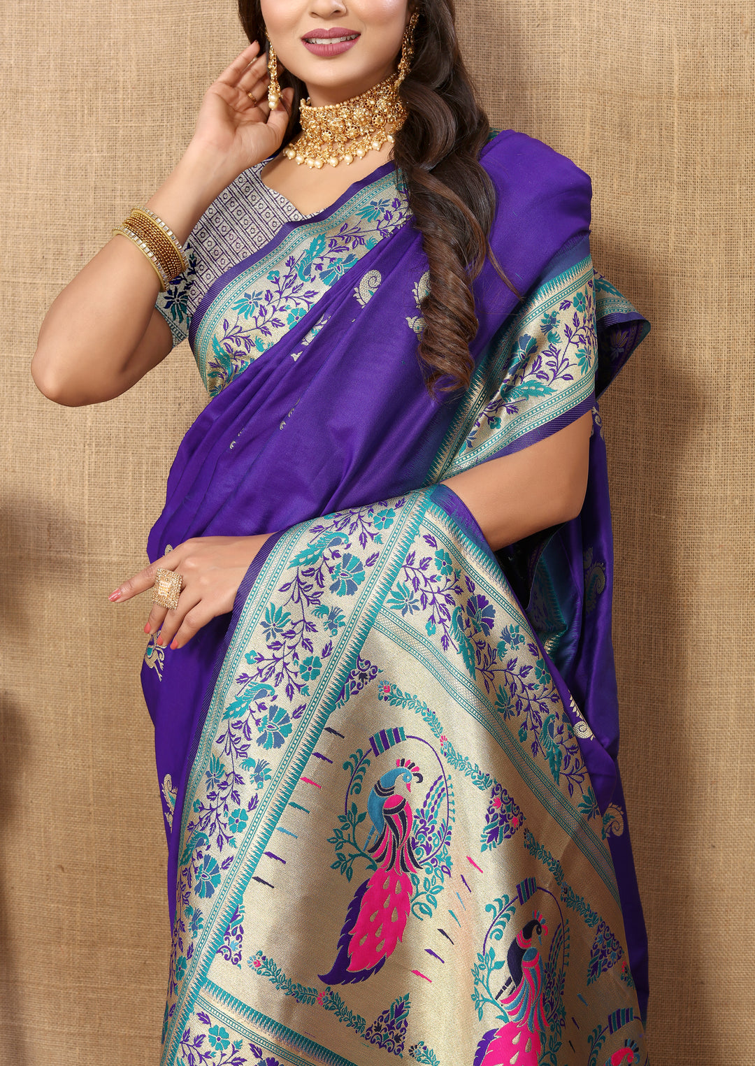 Blue Paithani saree with luxurious zari border and chic tassels, ideal for traditional celebrations.