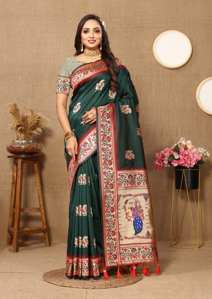 Designer teal-green Paithani silk saree with zari border and chic tassels, perfect for festive occasions.