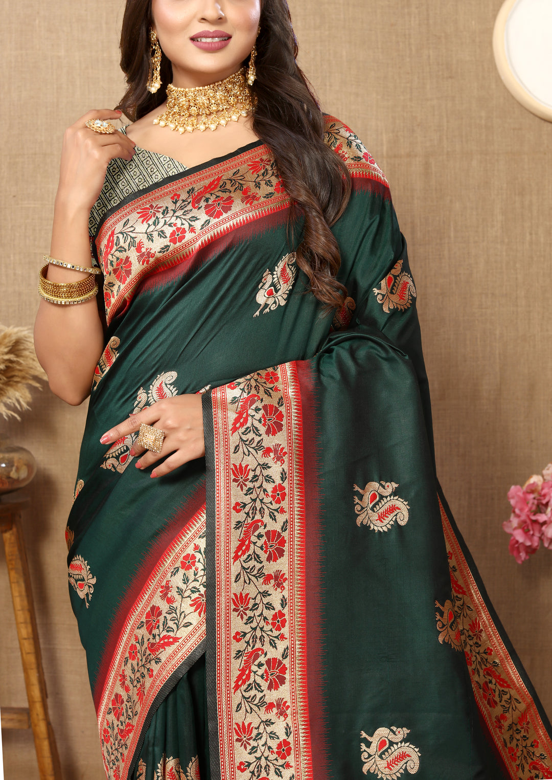 Teal-green Paithani saree with stunning zari work and tassels, ideal for weddings and ceremonies.