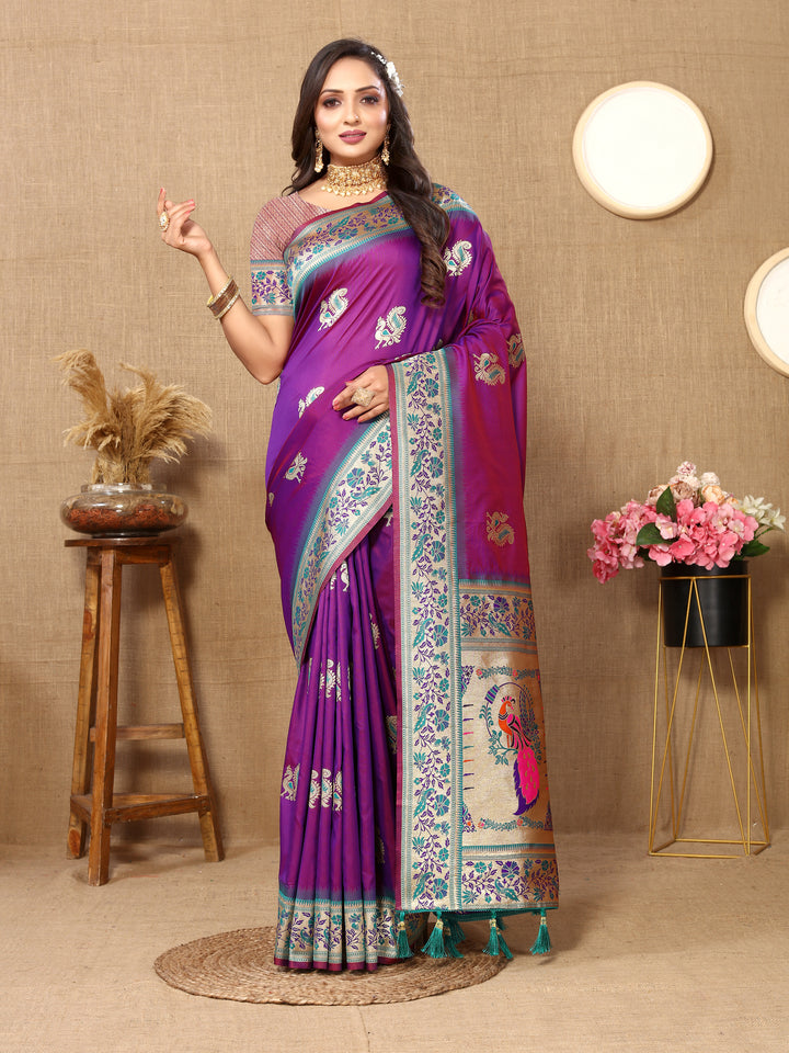 Designer purple Paithani silk saree with rich zari border and chic tassels, ideal for grand occasions.