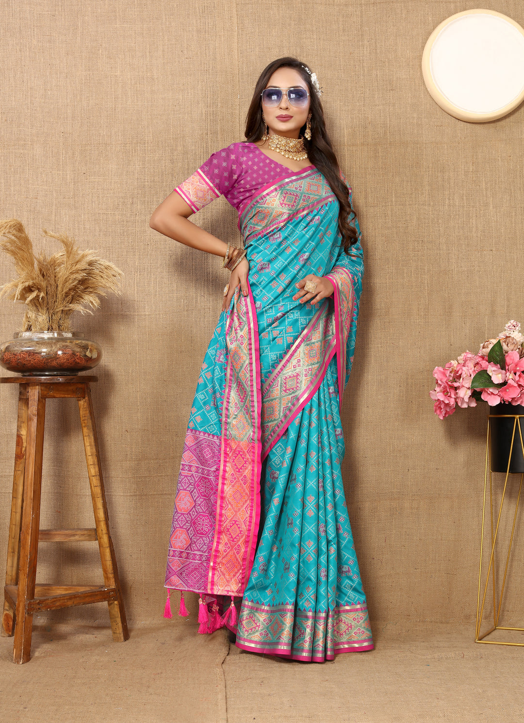 Elegant sky blue Patola silk sari with beautiful pallu and zari work, perfect for cultural gatherings.