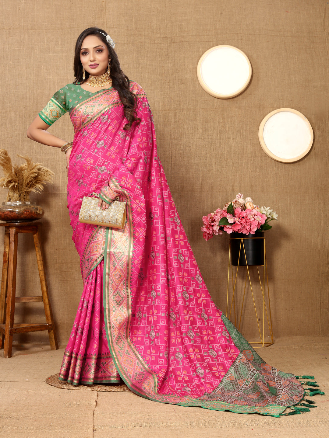 Vibrant pink Designer Patola silk sari with intricate pallu and zari detail, perfect for festive occasions.