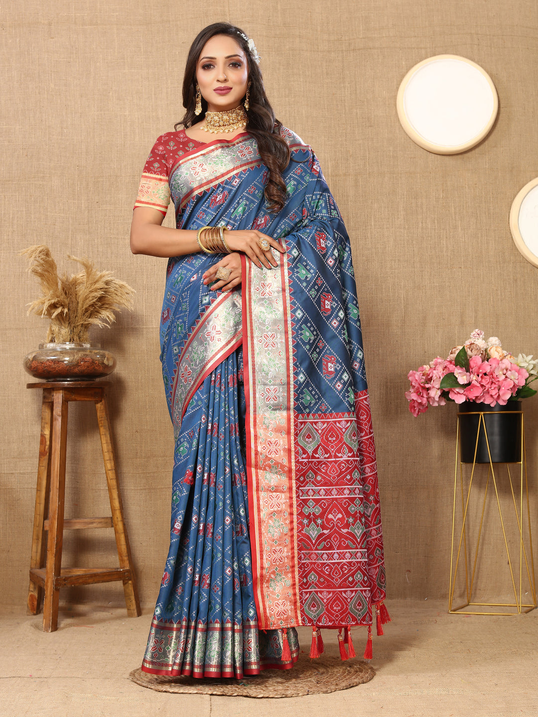 Elegant purple Patola silk saree with Meenakari and zari accents, perfect for cultural and festive occasions.