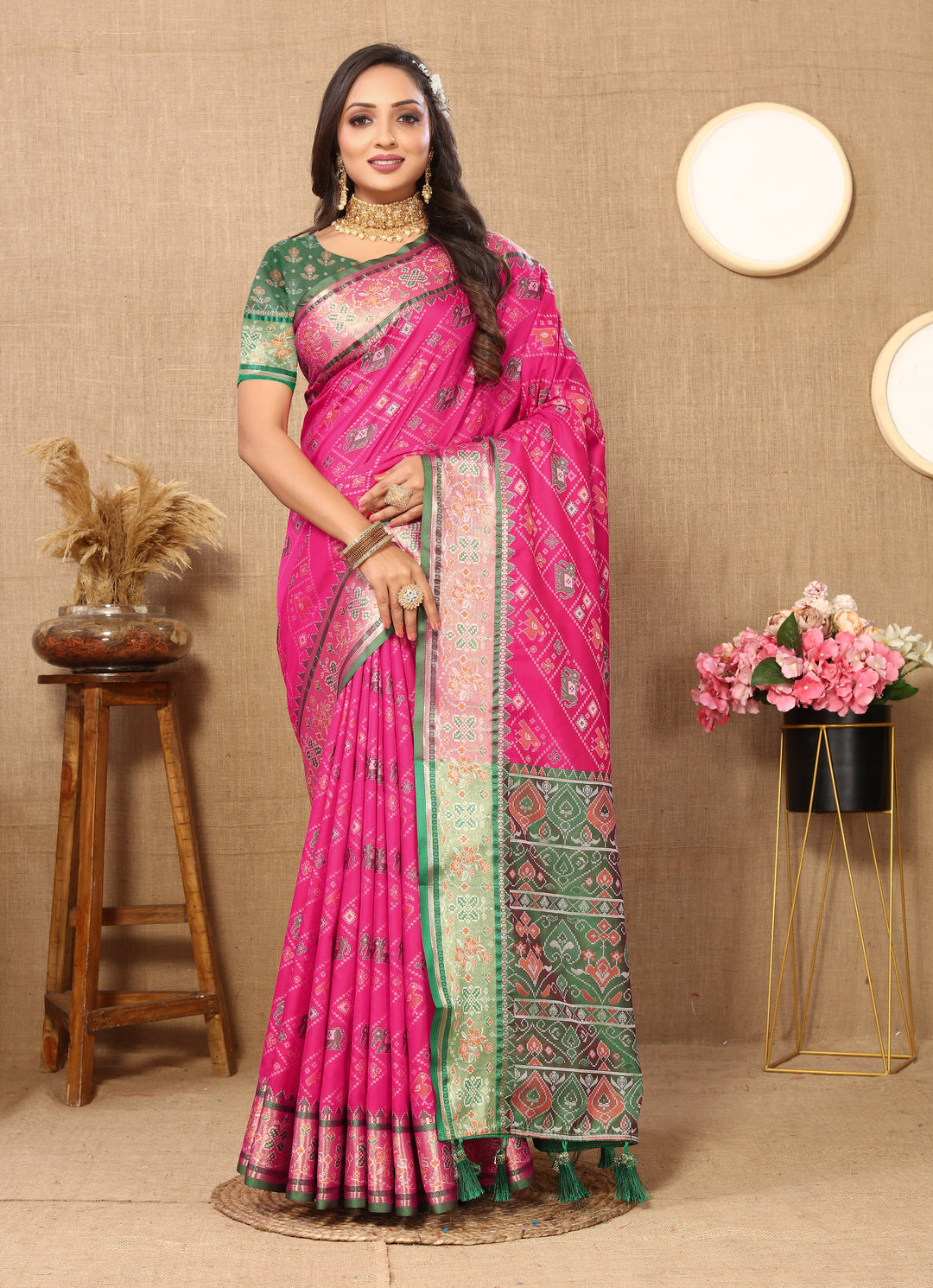 Elegant yellow Patola silk saree with traditional Meenakari motifs and zari weaving, perfect for special occasions.